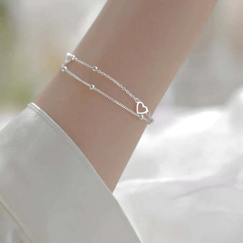 Adjustable Silver Jewelry Bracelet with Heart-Shaped Design