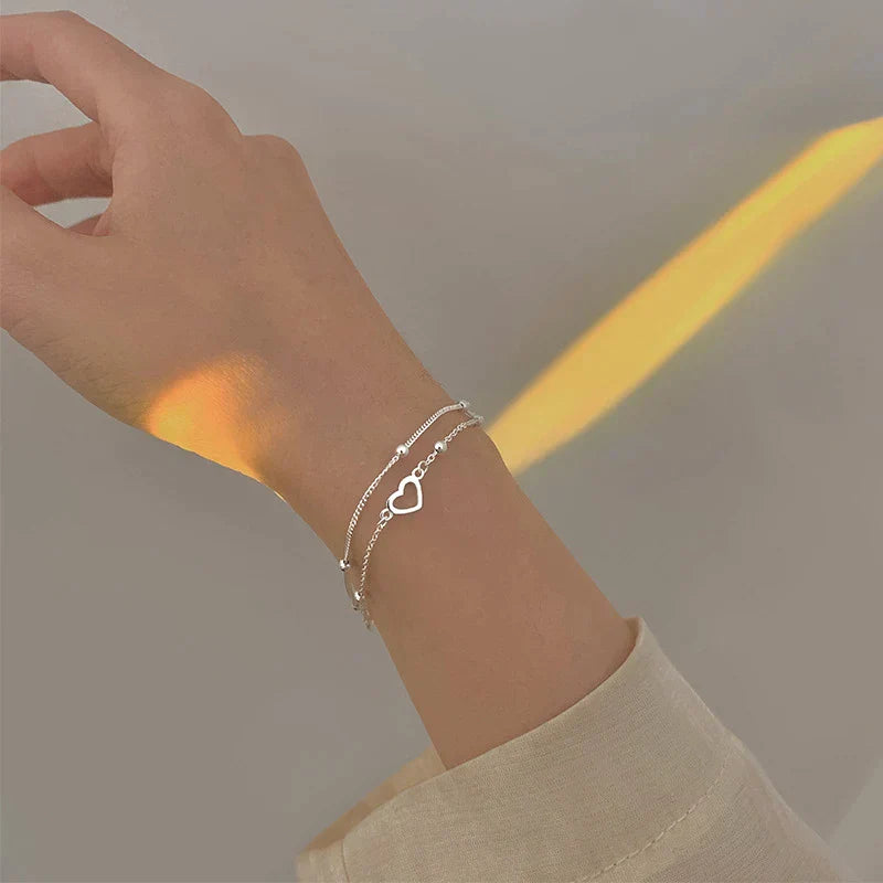 Adjustable Silver Jewelry Bracelet with Heart-Shaped Design
