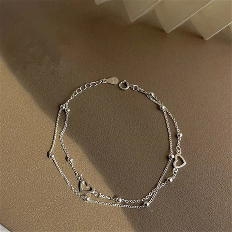 Adjustable Silver Jewelry Bracelet with Heart-Shaped Design