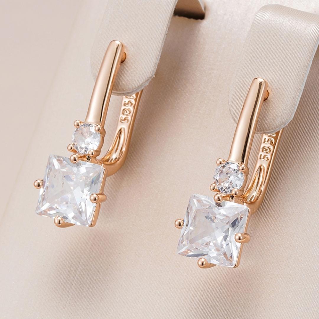 Radiant Gold Earrings Adorned with Dazzling Zirconia Gems