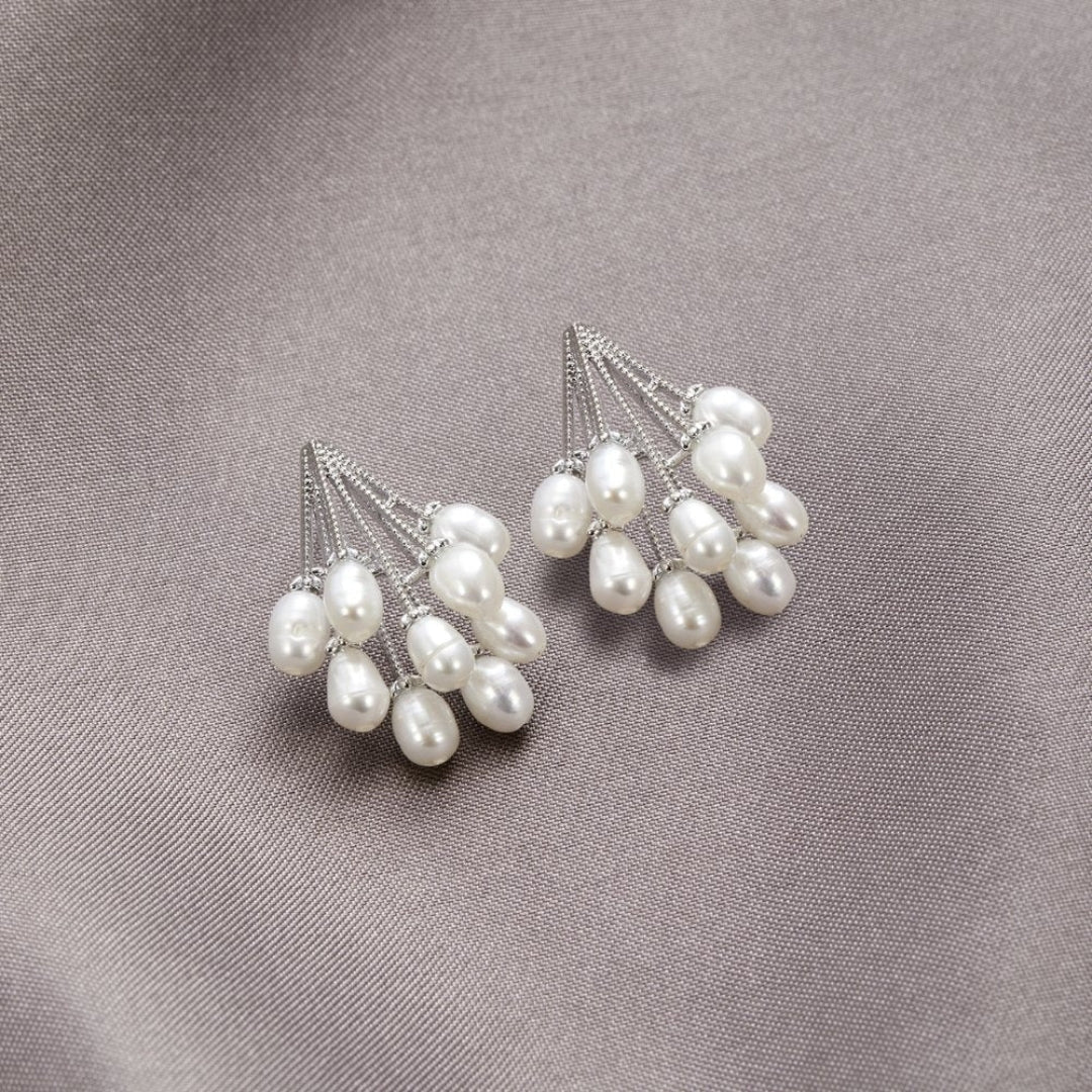 Elegant coral earrings with radiant freshwater pearls