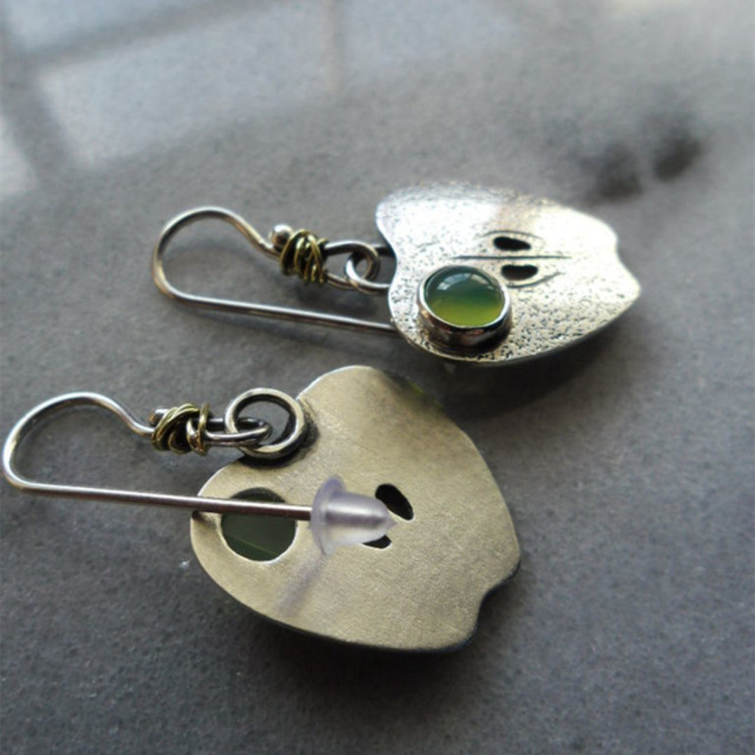 Stunning Silver Earrings Adorned with a Dazzling Green Crystal