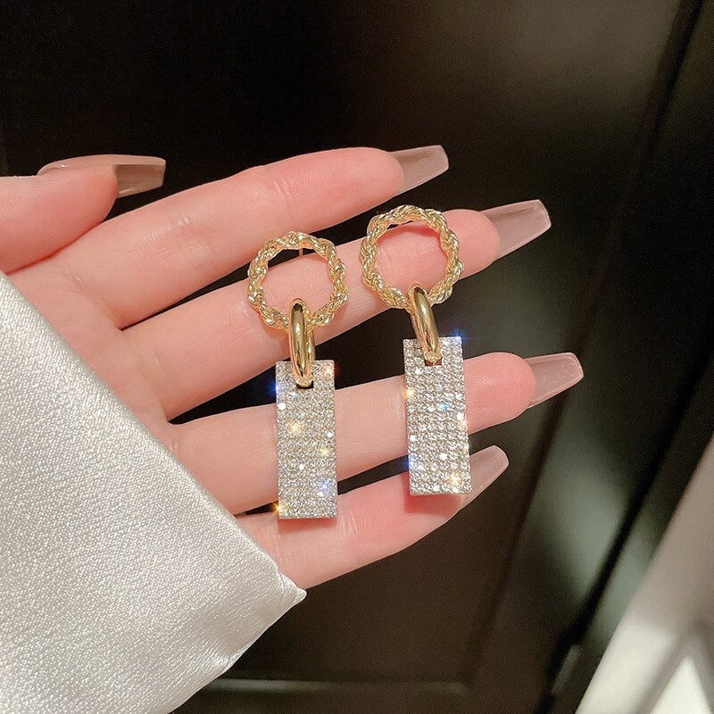 Exquisite Sterling Silver Earrings Adorned with Dazzling Zirconia and Radiant Rhinestone Accents