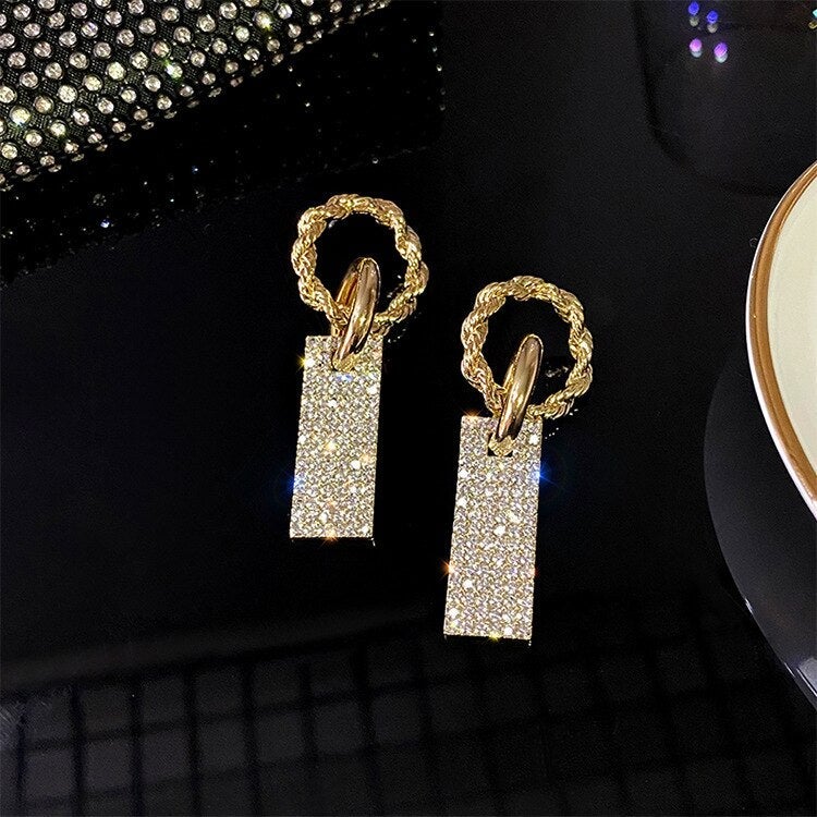 Exquisite Sterling Silver Earrings Adorned with Dazzling Zirconia and Radiant Rhinestone Accents