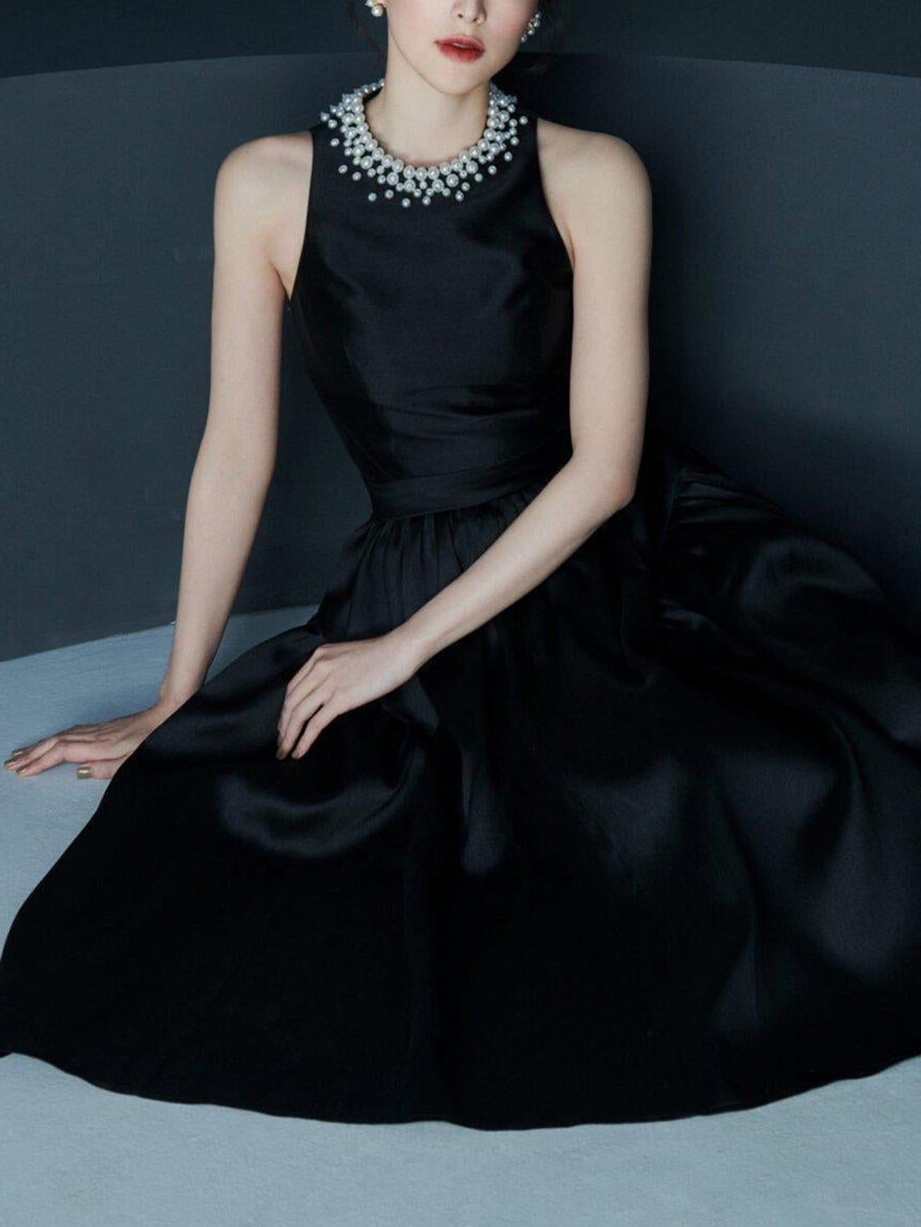 Timeless Halterneck Dress with Pearl Necklace
