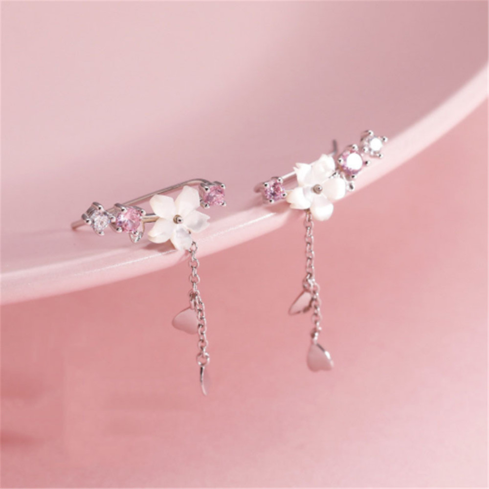 Stunning Silver Floral Earrings Adorned with Delicate Pink Gemstones