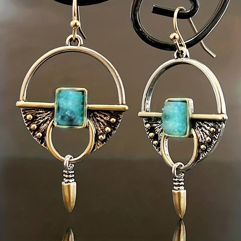 Stunning Egyptian-Inspired Earrings Featuring a Dazzling Blue Vintage Gemstone