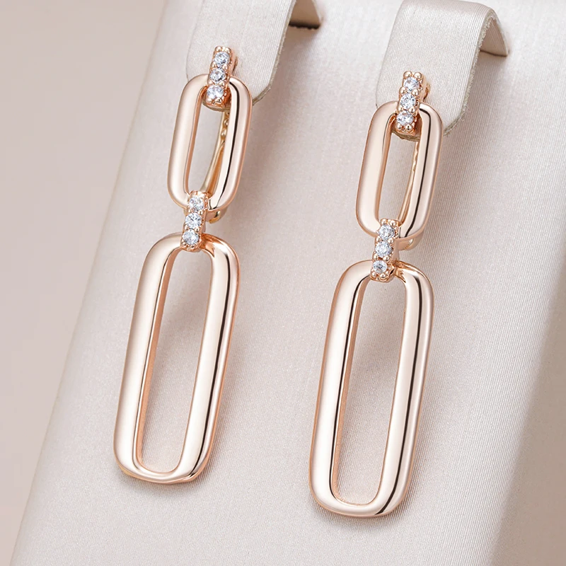 Chic Gold Dangle Earrings with Unique Cutout Design