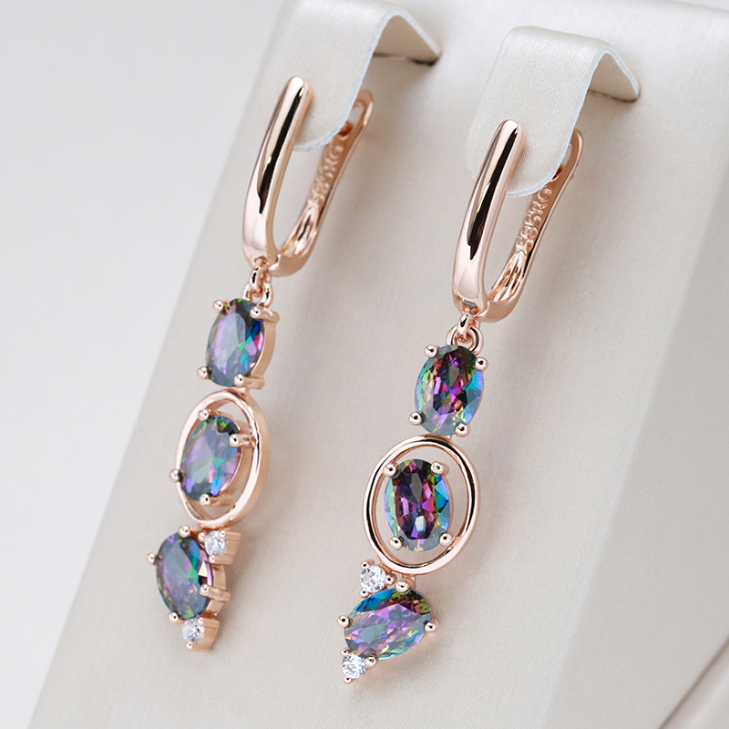 Elegant Gold Sparkling Earrings Adorned with Vibrant Crystals