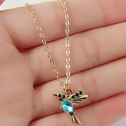 Fascinating hummingbird necklace made of shimmering enamel and sparkling zirconium dioxide