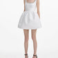 Sleeveless Bubble Hem Dress with Beaded Neckline