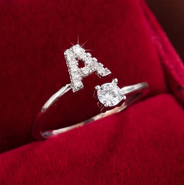 Elegant diamond letter ring made of gold and silver