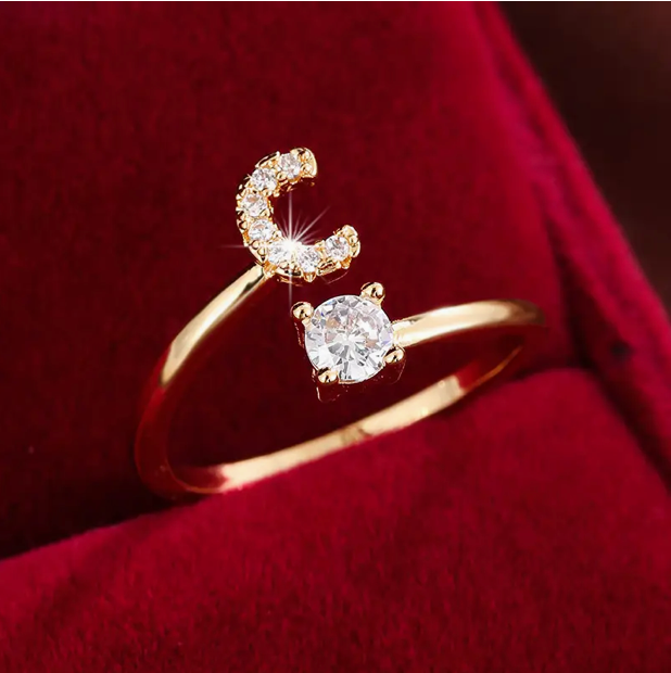 Elegant diamond letter ring made of gold and silver