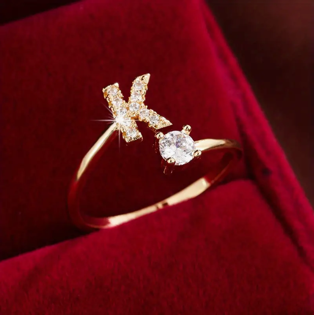 Elegant diamond letter ring made of gold and silver