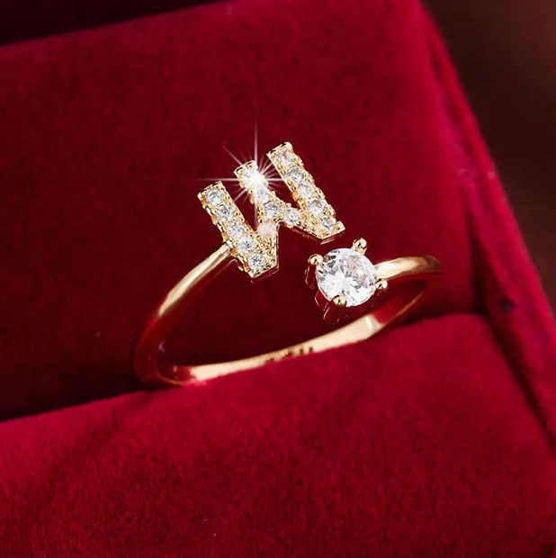 Elegant diamond letter ring made of gold and silver