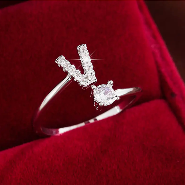 Elegant diamond letter ring made of gold and silver