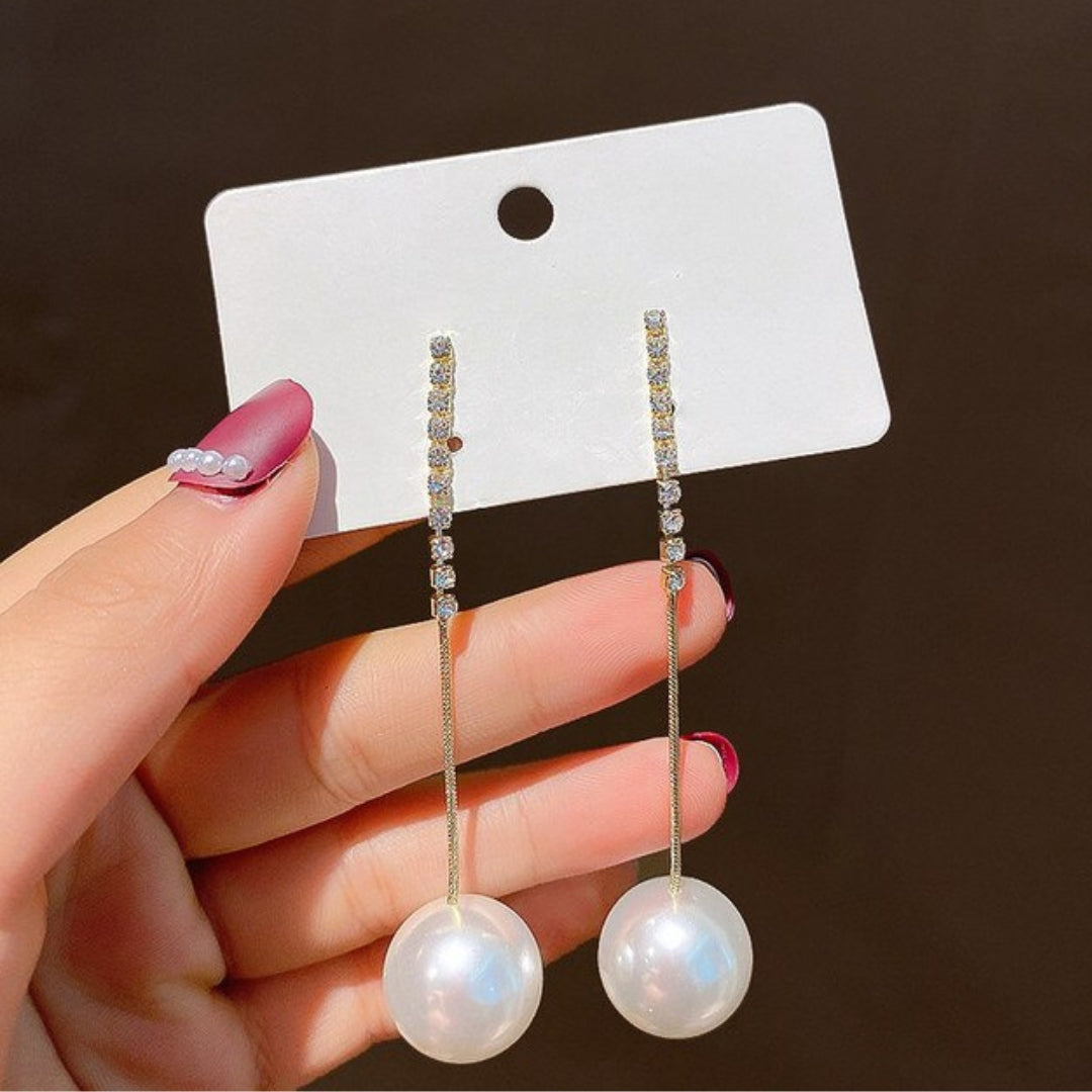 Stunning Gold Earrings Adorned with Dazzling Zirconia and Graceful Pearl Pendants