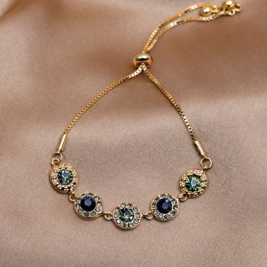 Elegant adjustable gold bracelet with sparkling zirconia stones