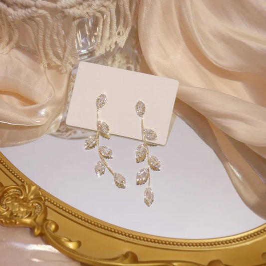 Stunning Gold and Silver Earrings Featuring Dazzling Zirconia Leaf Pendant