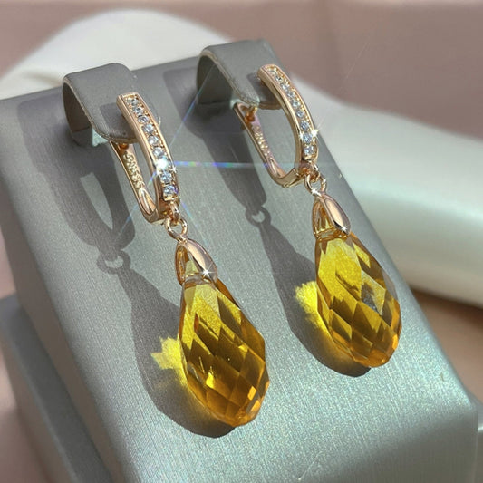 Stunning Golden Earrings Adorned with Vibrant Yellow Crystal Drops