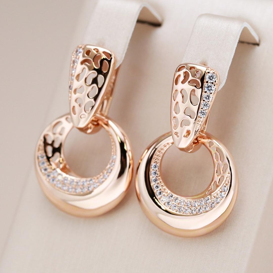 Stylish Gold Earrings Featuring a Chic Circular Scale Design