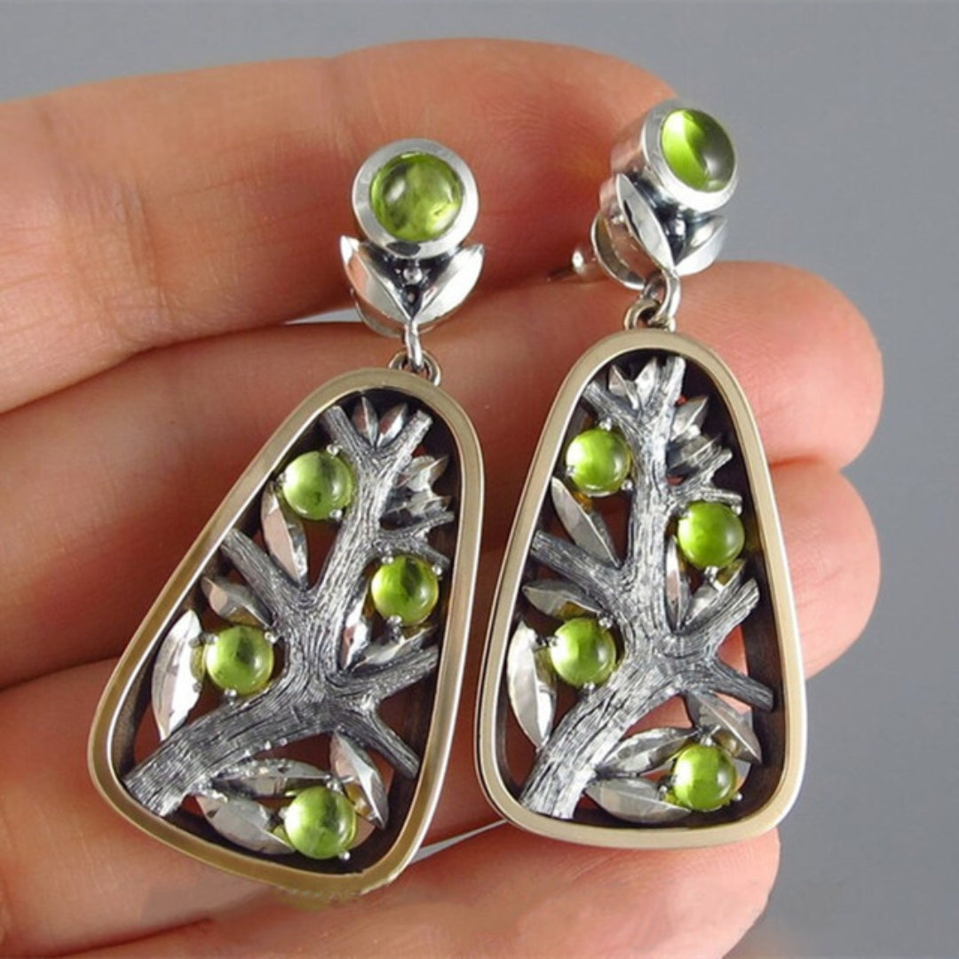 Stunning Green Crystal Earrings Adorned with Premium Silver