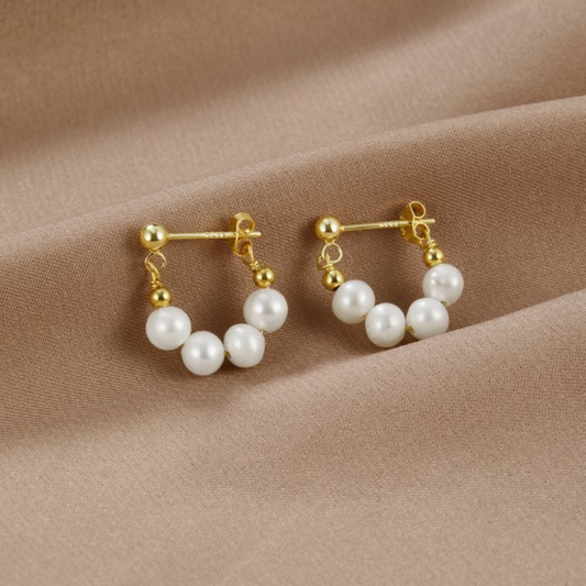 Stunning Gold Earrings Adorned with Shimmering Freshwater Pearls