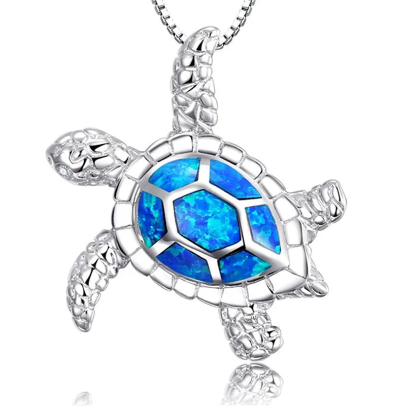 Necklace with sea turtle motif and sparkling blue opal