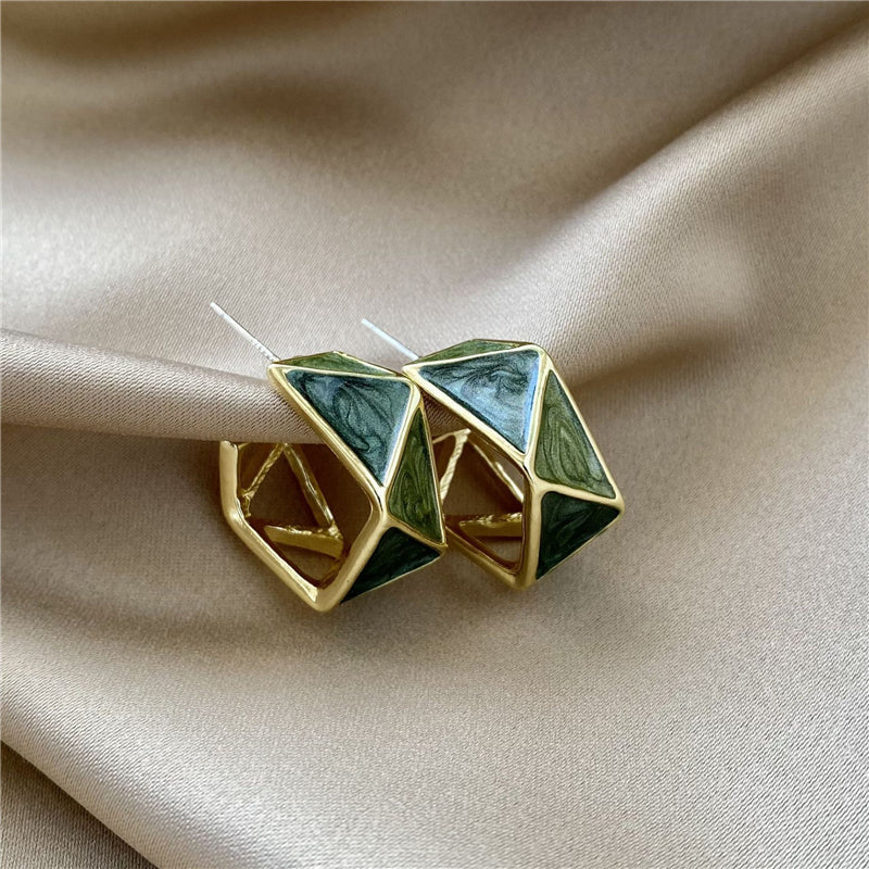 Stunning Gold Earrings Adorned with Exquisite Green Enamel Details