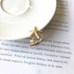 Elegant adjustable starfish ring made of silver and gold