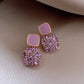 Stunning Purple Earrings Adorned with Dazzling Zirconia Accents