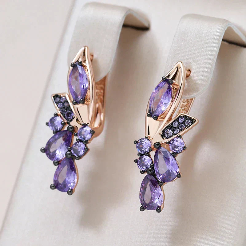 Opulent Gold Earrings Adorned with Dazzling Purple Zirconia