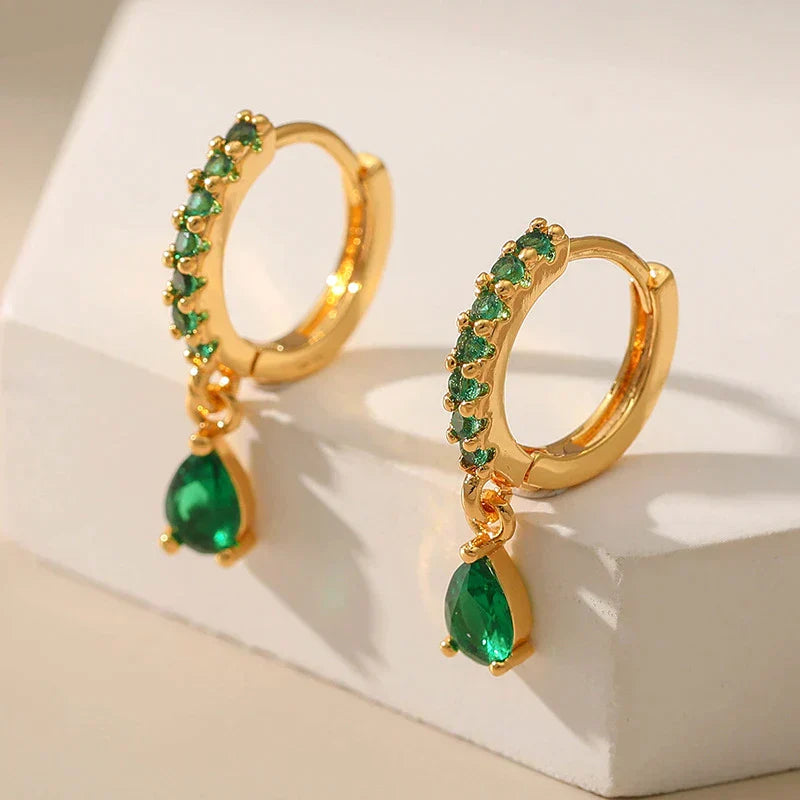 Stunning Gold Earrings Adorned with Dazzling Zirconia and Radiant Emeralds