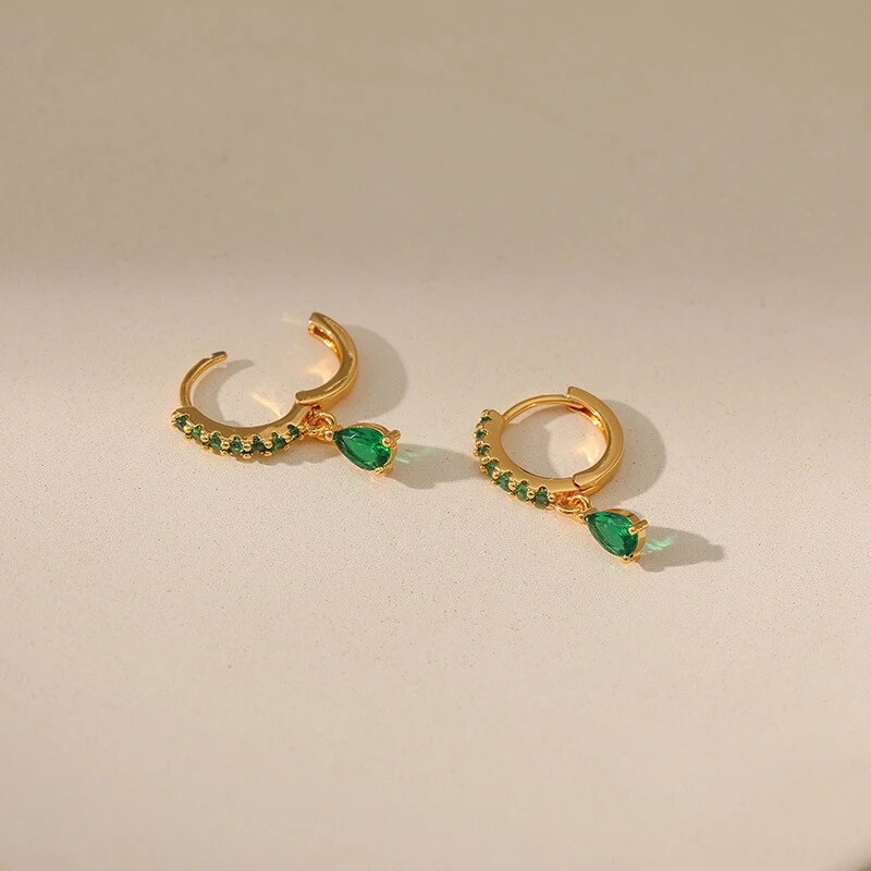 Stunning Gold Earrings Adorned with Dazzling Zirconia and Radiant Emeralds