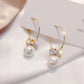 Stunning Gold Earrings Adorned with Radiant Pearls