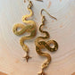 Stunning Gold Earrings Featuring a Dazzling Star Snake Pendant