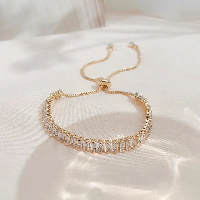 Elegant adjustable bangle with sparkling cubic zirconia in fine gold and silver