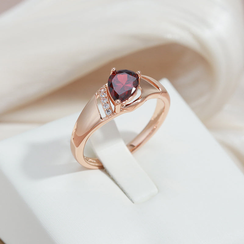 Elegant Oval Ring with Natural Red Zircon