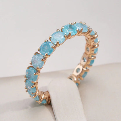 Elegant gold ring with sparkling round gemstone