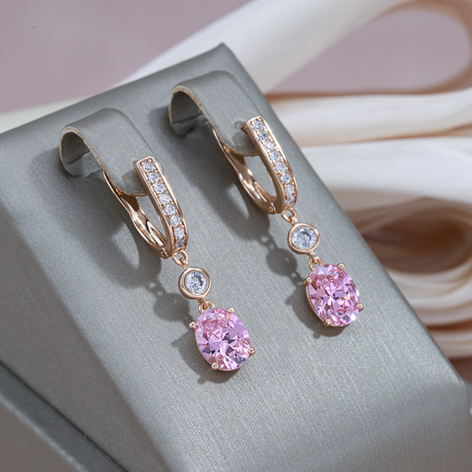 Stunning Gold Earrings Adorned with a Beautiful Rose Crystal Pendant