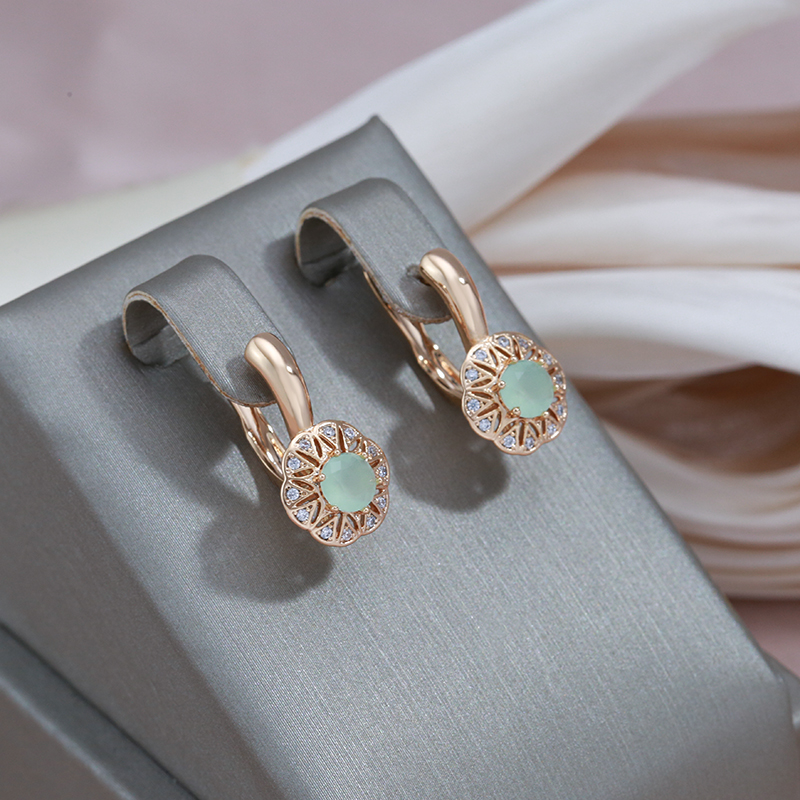 Chic Gold Earrings Adorned with Dazzling Zirconia and a Striking Green Accent