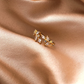 Elegant adjustable ring with sparkling crystal leaves in noble gold