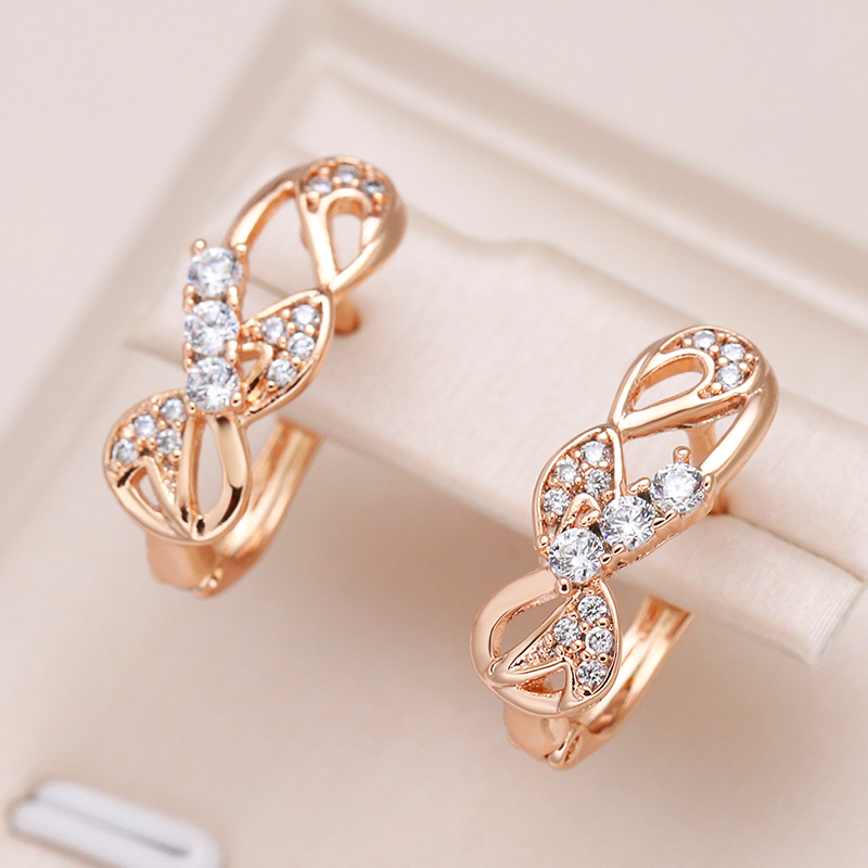 Chic Crystal Earrings Adorned with a Dazzling Gold Bow