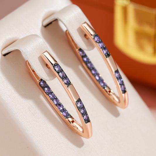 Dazzling Gold Earrings Adorned with Glittering Purple Zirconia Gems