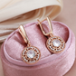 Dazzling Gold Earrings Adorned with Sparkling Crystal Highlights