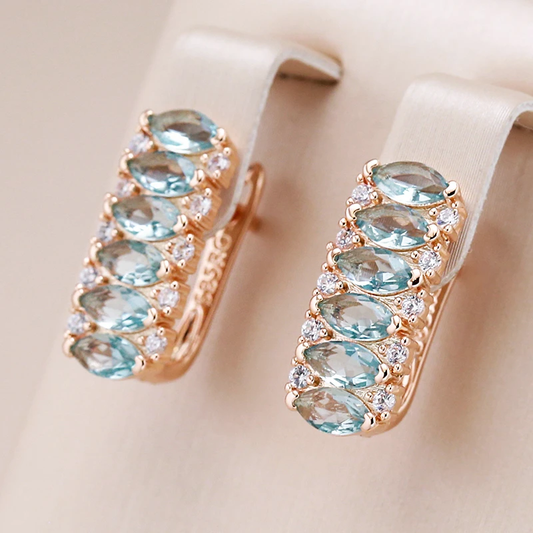 Stunning Gold Earrings Adorned with Turquoise Crystals