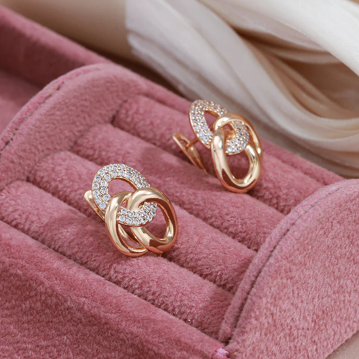 Glittering Gold Earrings Adorned with Zirconia - A Touch of Sophistication for Any Event