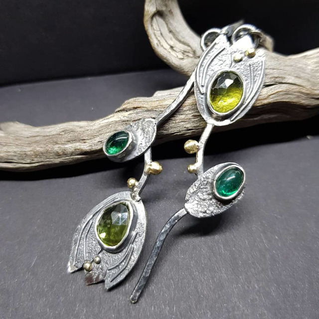 Chic Boho Earrings Crafted from Sterling Silver, Adorned with Dazzling Green Gems