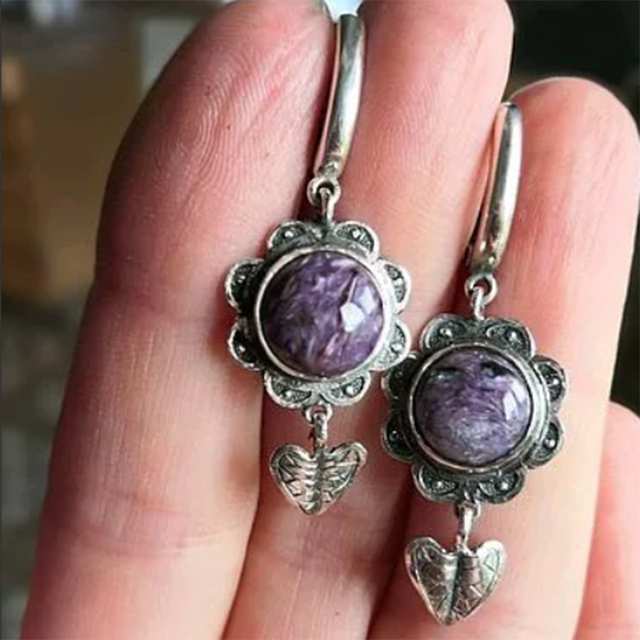 Stunning Vintage Earrings Adorned with Enchanting Purple Gemstones