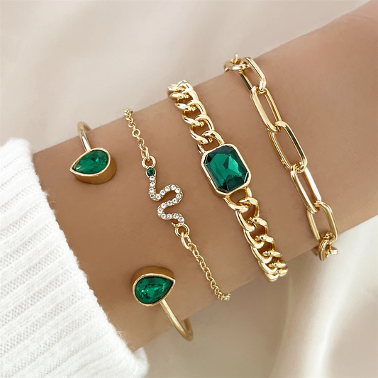 Set of elegant bracelets with sparkling green crystals